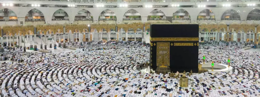 A serene scene of pilgrims engaging in quiet conversations during Umrah, contrasting with the grand unity and diverse faces of Hajj's symphony. Discover the emotional depth and unique impressions of these Islamic journeys